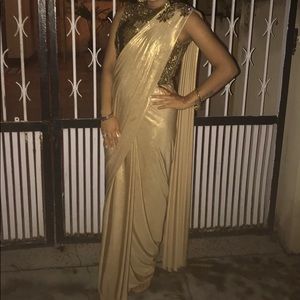 Pre tied gold sari